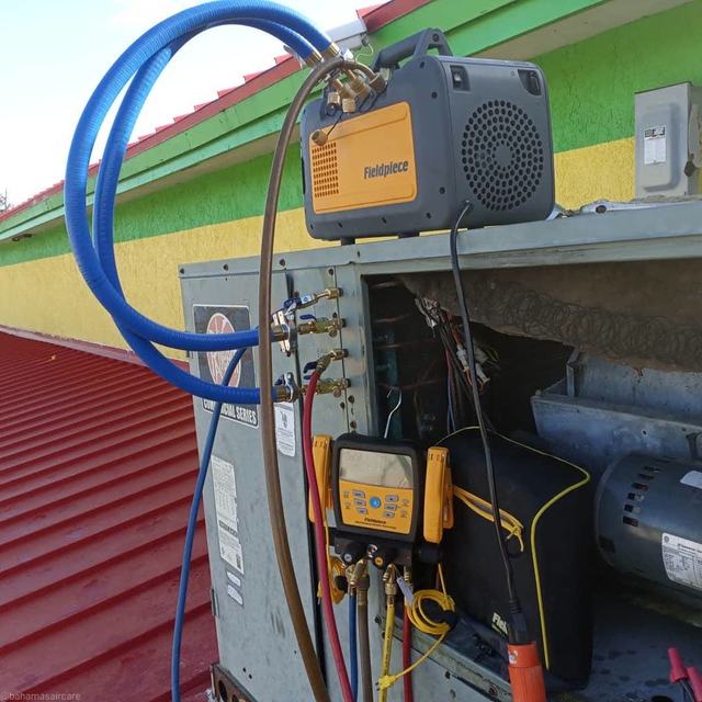 A/C condensing unit with service gauges attached